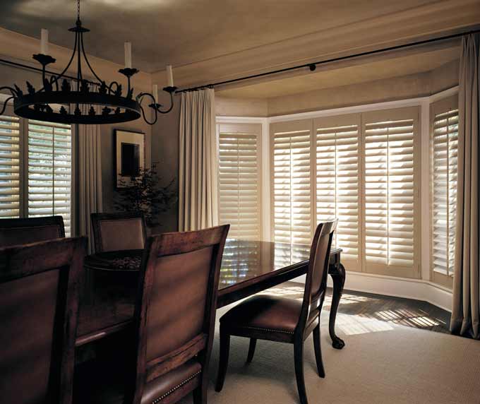 Hunter Douglas Heritance hardwood shutters are the perfect window covering solution for bow and bay windows offering privacy, light control and character. 