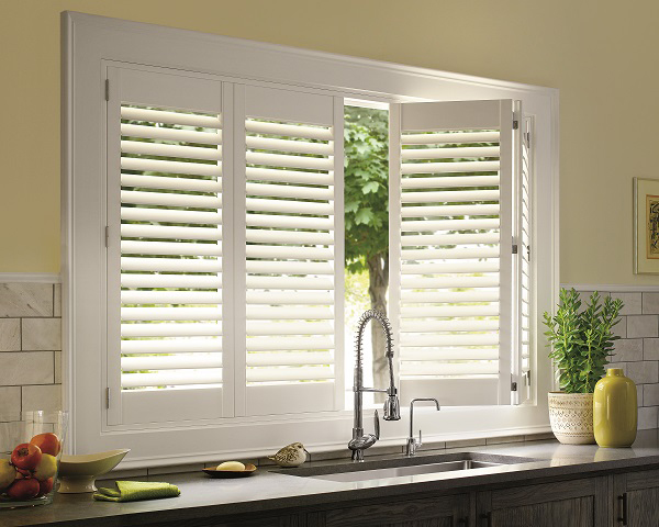 Palm Beach shutters work well for kitchen windows because they are easy to clean.